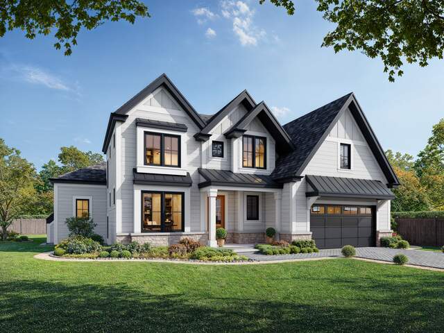 Modern suburban house with manicured lawn.